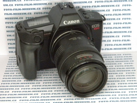 Úplně nový profi fotoaparát od Canonu představený v roce 1987. Nová ergonomie těla ale hlavně nový bajonet EF a AF. Elektronická lamelová vertikální závěrka má 30s. - 1/4000s. Synchročas 1/250s. 