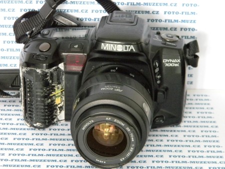 Zrcadlovka vyšší stř. třídy vyr. od r. 1993. Lamelová záv. 30s.-1/8000s+B. X-sync 1/200s. 14 segm. měření. 4 bodový AF. Na boku slot pro datové karty. Má funkci Eye start-po přiložení k oku začne zaostřovat. Oloupaný plast na gripu je normální.